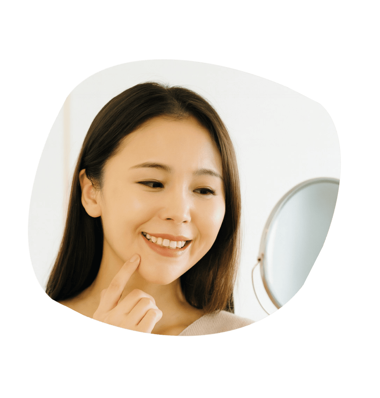 歯を見てい要る女性の画像